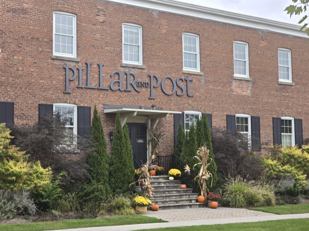 a brick building with a sign on the front