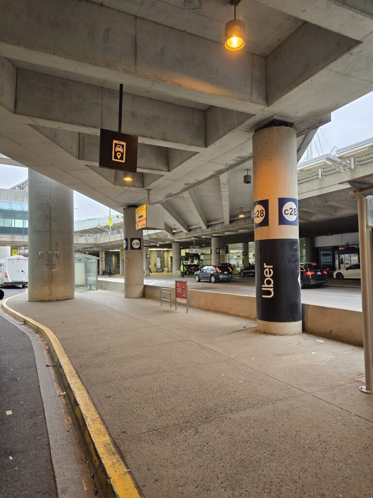 uber at toronto airport terminal 3 pickup spot pillar